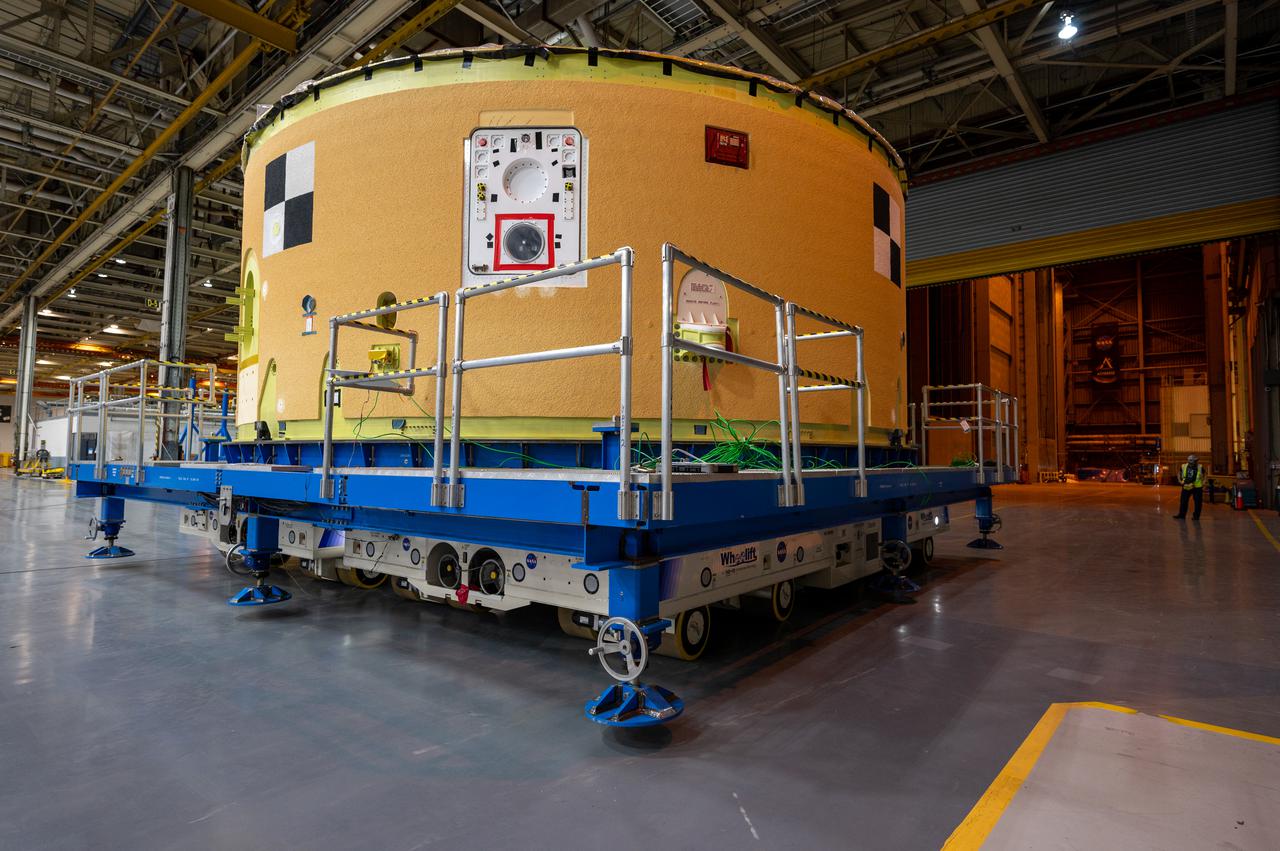 This image shows the forward skirt that will be used on the core stage of NASA’s Space Launch System rocket for Artemis II, the first crewed mission of NASA’s Artemis program, at NASA’s Michoud Assembly Facility. The SLS core stage is made up of five unique elements: the forward skirt, liquid oxygen tank, intertank, liquid hydrogen tank, and the engine section. The forward skirt houses flight computers, cameras, and avionics systems. The hardware is located at the top of the 212-foot-tall core stage and connects the upper part of the rocket to the core stage. Soon, technicians will ready the forward skirt for the first of three core stage assembly mates called the forward join. The forward join consists of three main parts -- the forward skirt, liquid oxygen tank, and intertank – to create the top, or forward part, of the core stage. Together with its four RS-25 engines, the rocket’s massive 212-foot-tall core stage — the largest stage NASA has ever built — and its twin solid rocket boosters will produce 8.8 million pounds of thrust to send NASA’s Orion spacecraft, astronauts and supplies beyond Earth’s orbit to the Moon and, ultimately, Mars. Offering more payload mass, volume capability and energy to speed missions through space, the SLS rocket, along with NASA’s Gateway in lunar orbit, the Human Landing System, and Orion spacecraft, is part of NASA’s backbone for deep space exploration and the Artemis lunar program. No other rocket is capable of carrying astronauts in Orion around the Moon in a single mission.